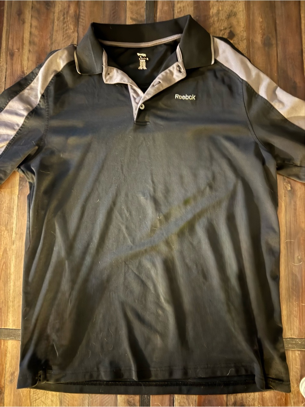 Reebok Black Polo with Gray Shoulder Stripes